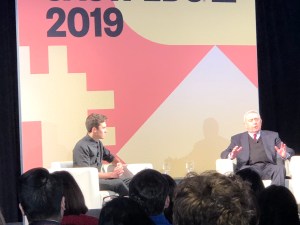 David Hogg and Dan Rathers sitting in chairs talking 